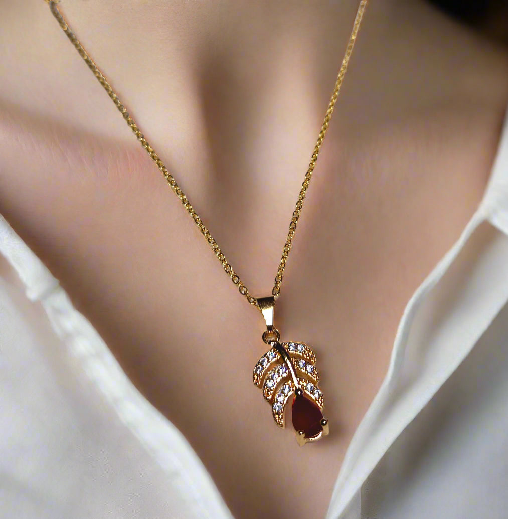 Gold Plated Leaf Pendant and Earring Set with Red Stone